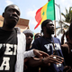 Senegalese rappers march during a rally. (Rebecca Blackwell/Associated Press)